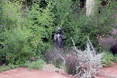 A statue in this courtyard garden